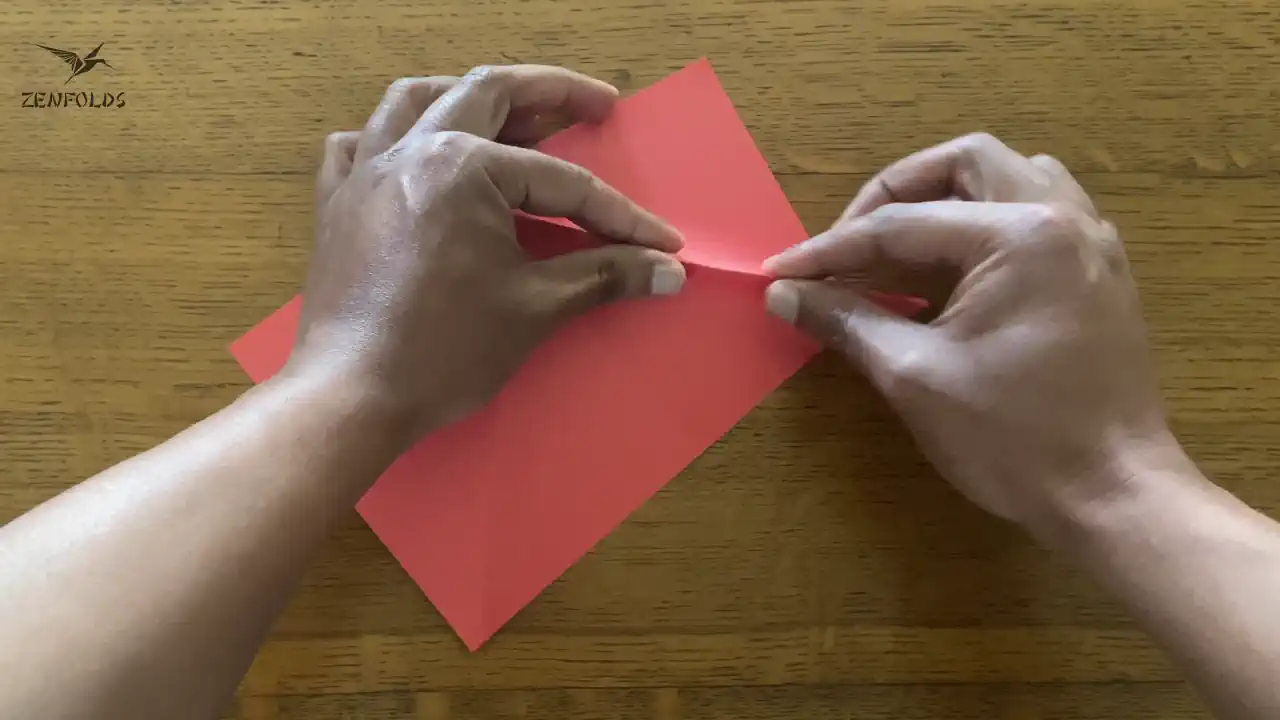 a valley fold being turned  into a mountain fold