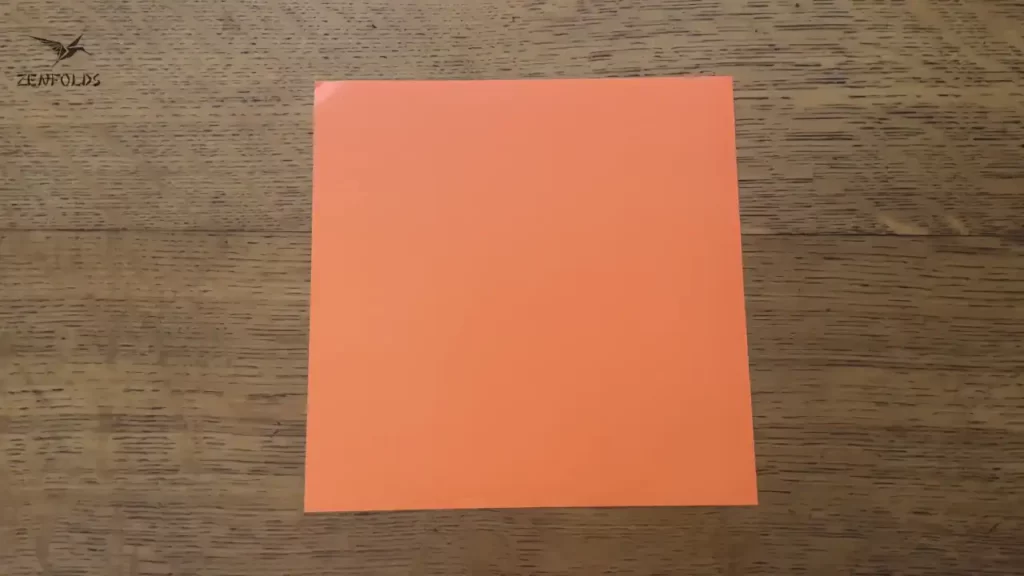 orange square origami sheet of paper