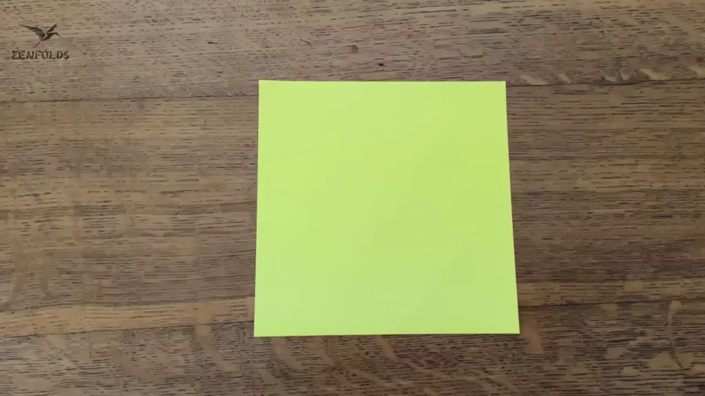 yellow square origami sheet of paper