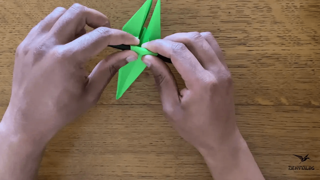 origami lily leaves curled by pencil